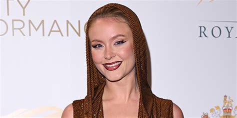 Zara Larsson goes braless in plunging bejewelled hooded dress